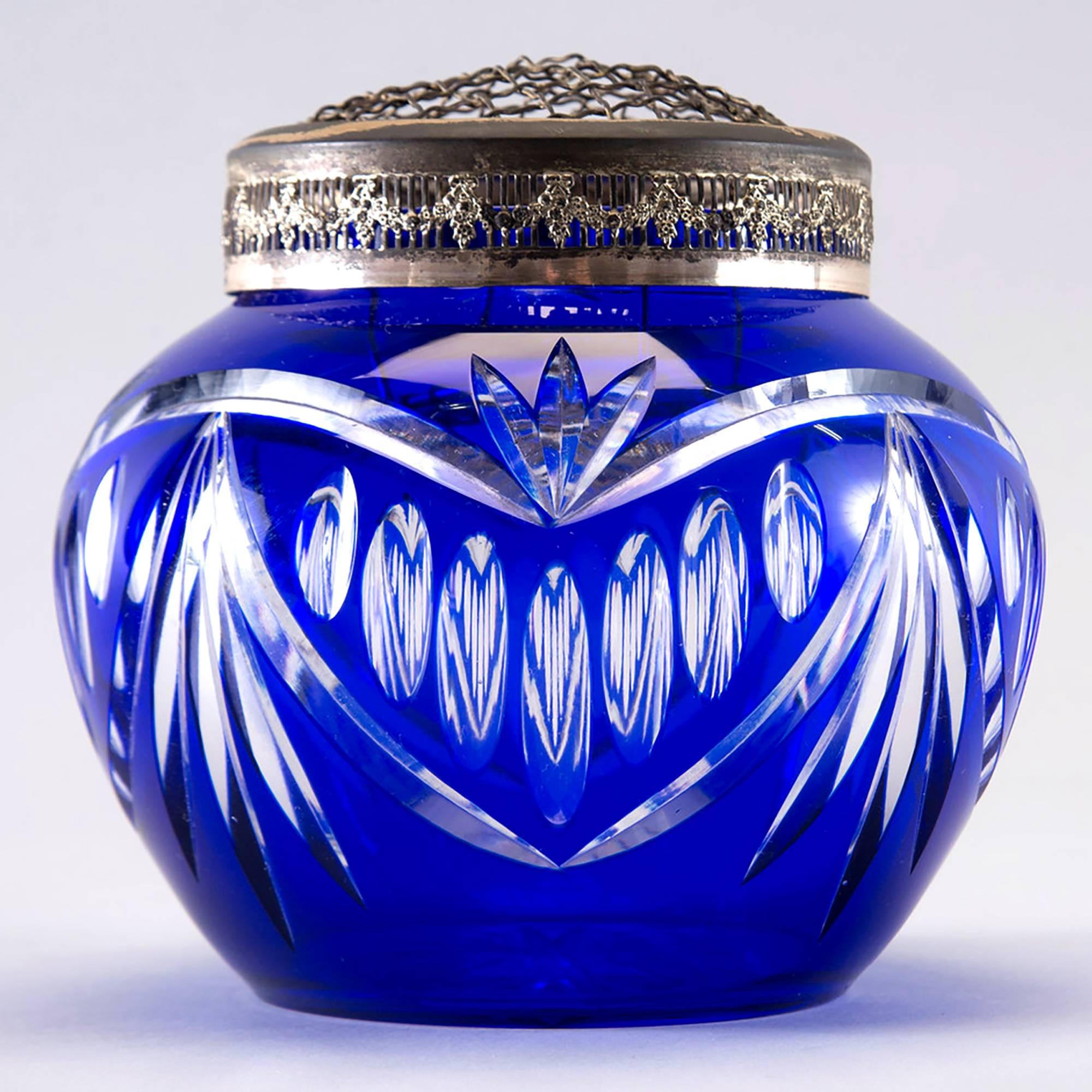 Circa 1920s European cut to clear cobalt blue crystal rose bowl vase with original brass flower frog topper. No maker’s mark, but believed to be Val St. Lambert of Belgium.