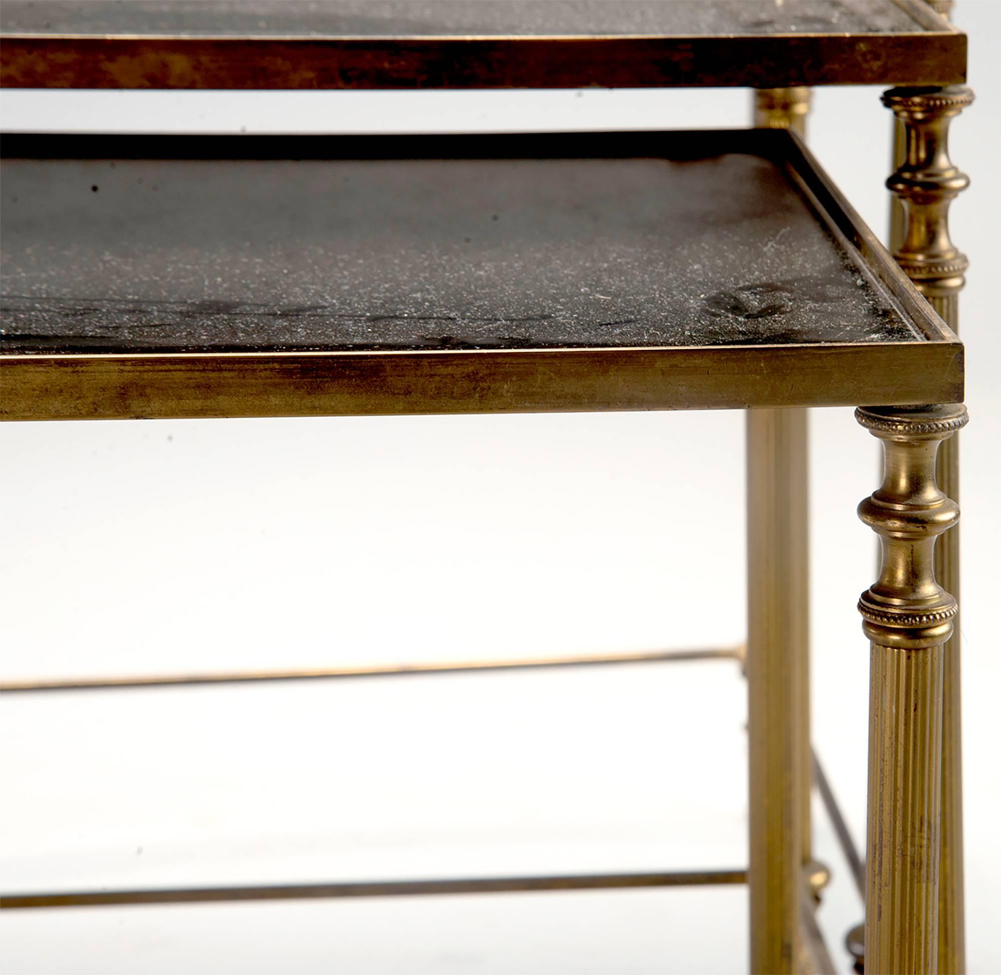 Neoclassical Trio of Brass and Black Mirrored Glass Nesting Tables