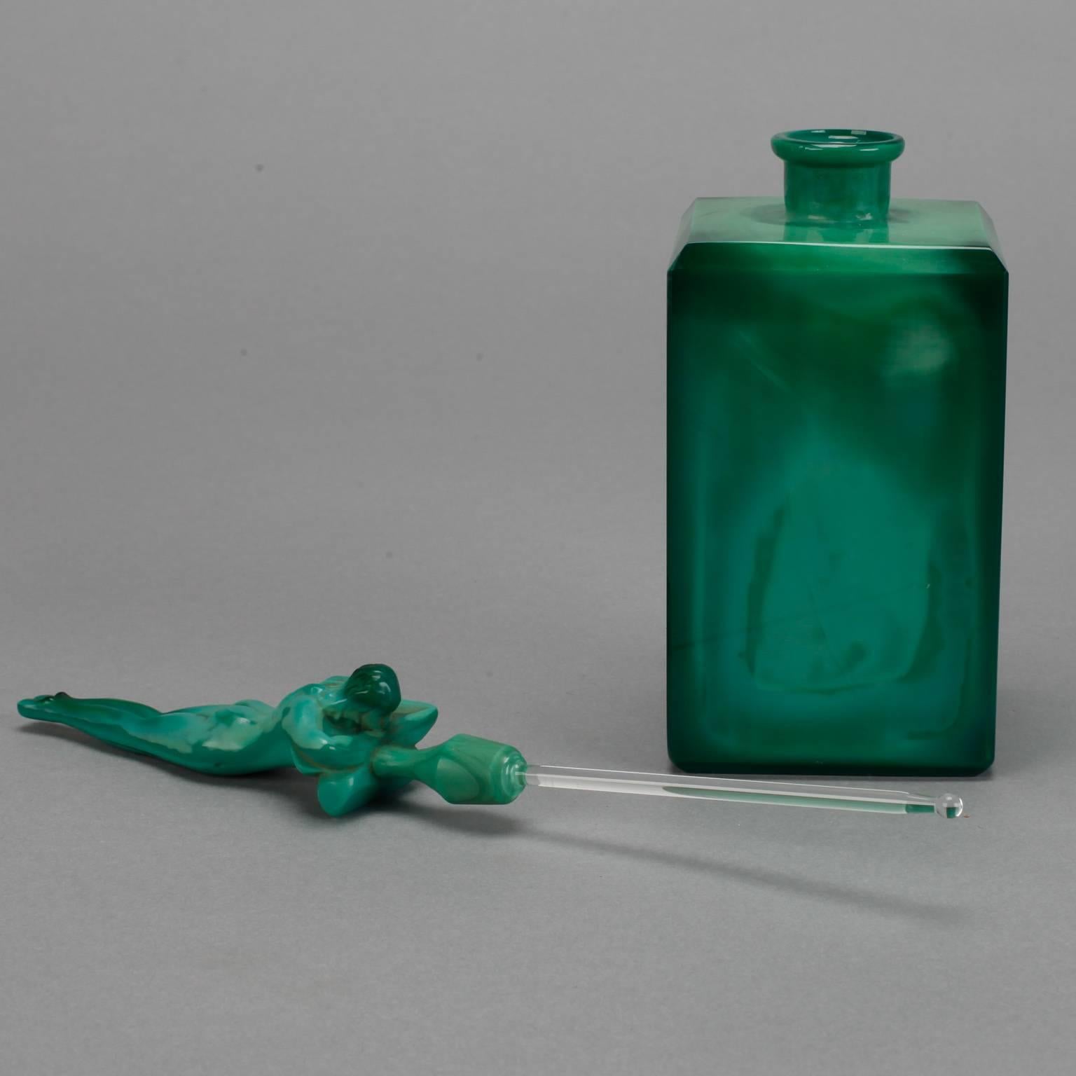Sought after circa 1930s Czech heavy malachite glass perfume in rectangular form with beautifully detailed nude female figure on stopper.