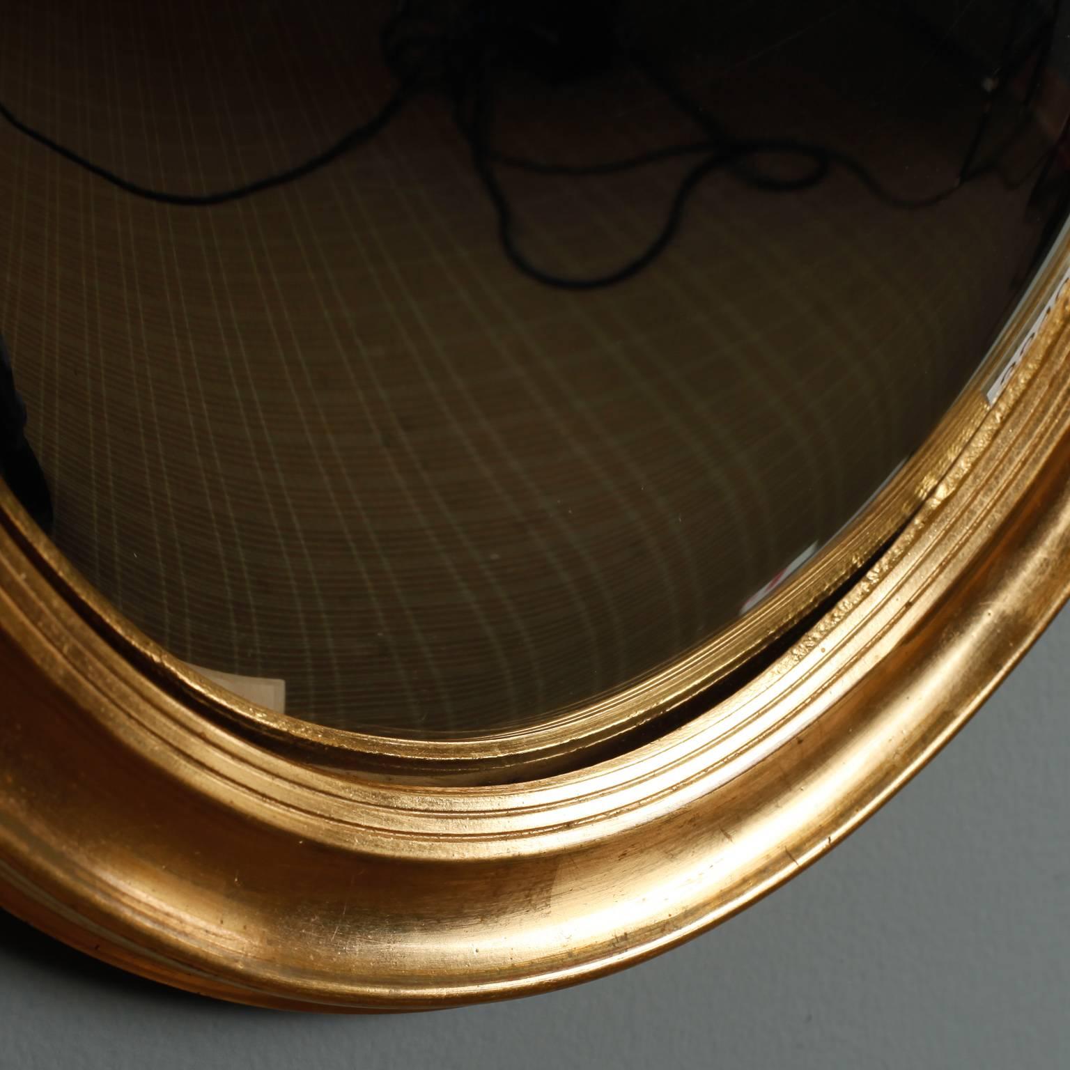 English Late 19th Century Oval Gilded Convex Butler's Mirror 