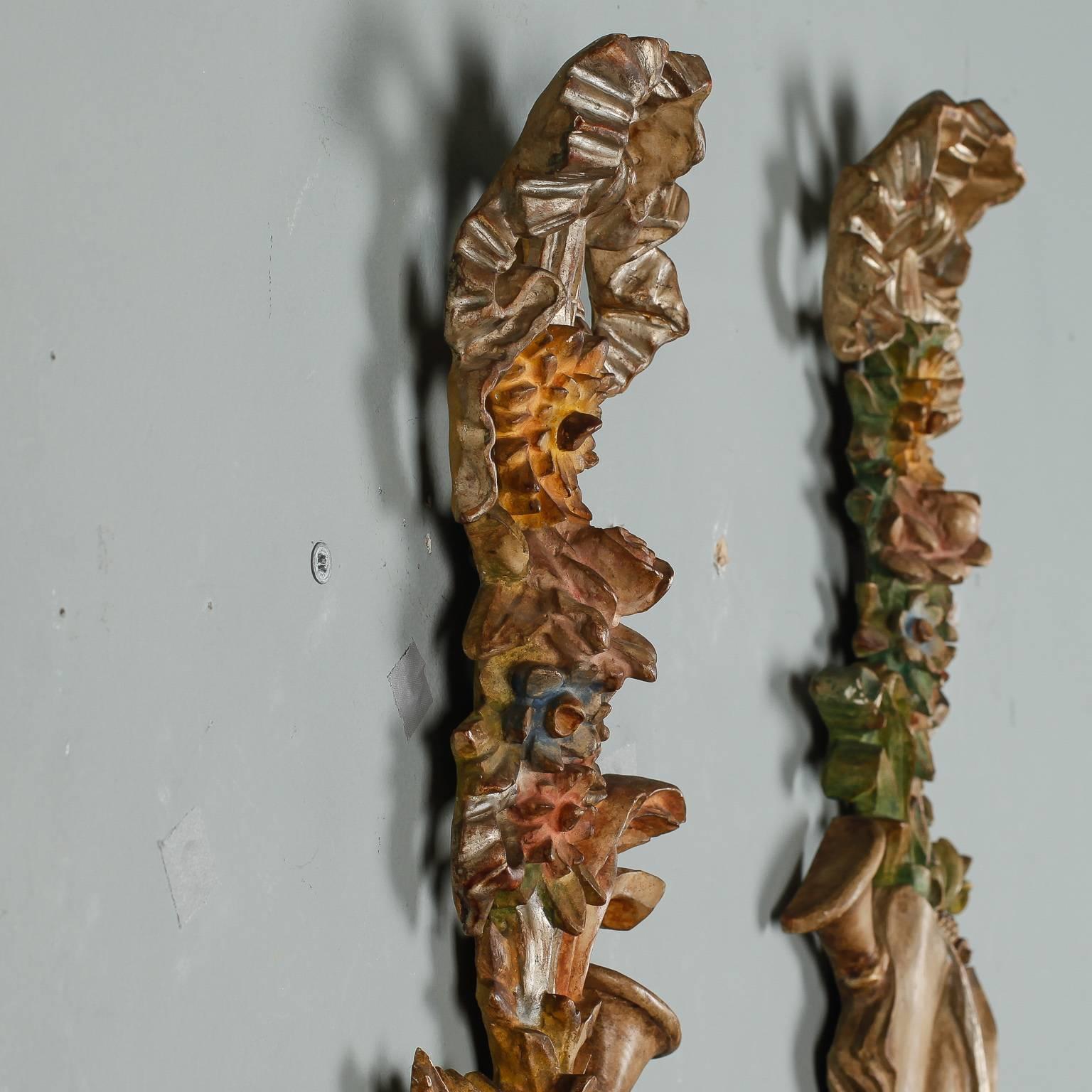 European Pair of Tall Painted and Gilded Wall Carvings Depicting Spring and the Arts For Sale