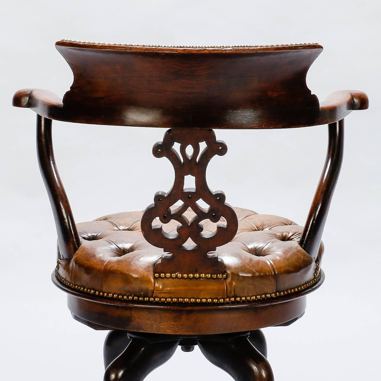 Carved French Mahogany and Tufted Leather Swivel Desk Chair  