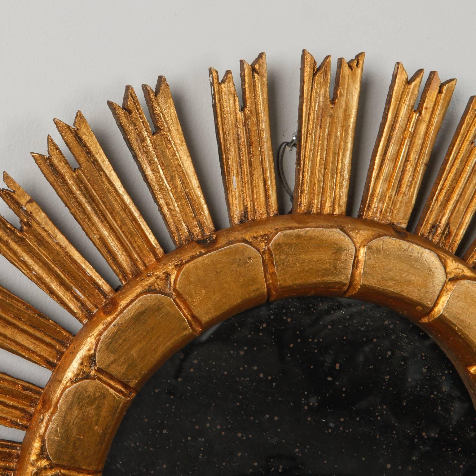 Carved Mid-Century Medium Size Giltwood Sunburst Mirror For Sale