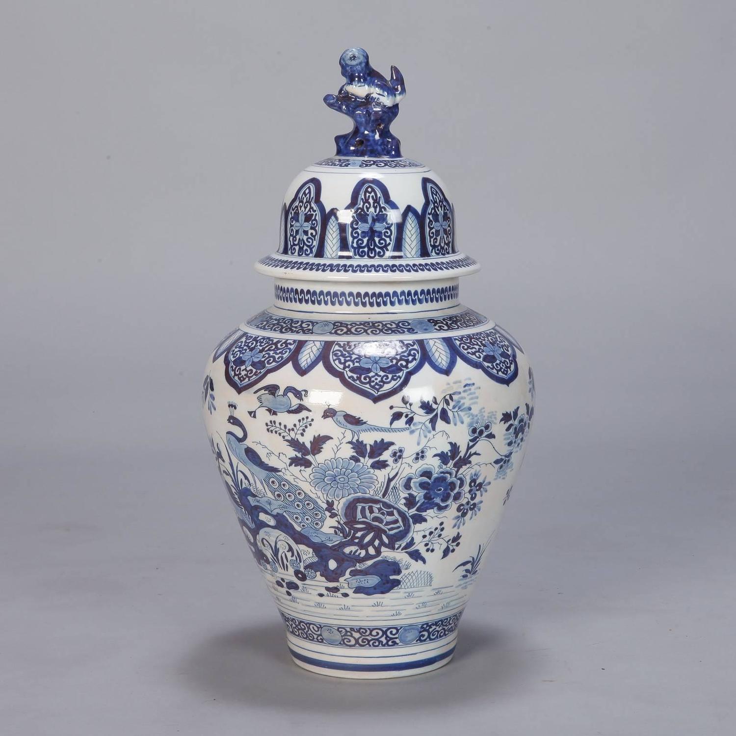 Early 20th Century Blue and White Dutch Chinoiserie Urn or Vase with Foo Dog Lid For Sale at 1stdibs