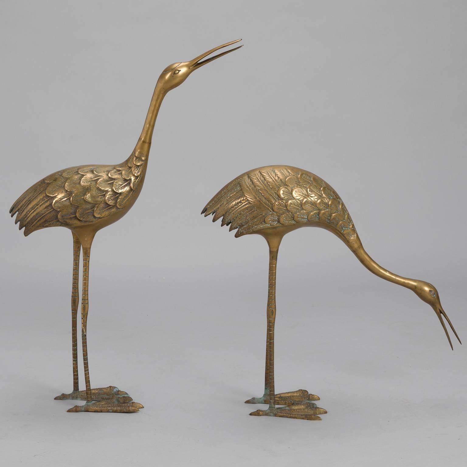 Pair of tall cranes or herons rendered in brass found in Italy, circa 1970s. Unknown maker and origin. Taller crane measurements are shown. Shorter, stooping crane measures as follows: 24” high X 26” wide X 7.5” deep. Sold and priced as a pair.
  