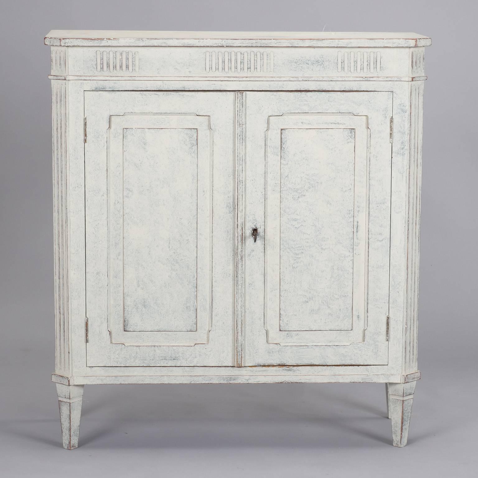 French White with Blue-Gray Undertones Two-Door Cabinet 1