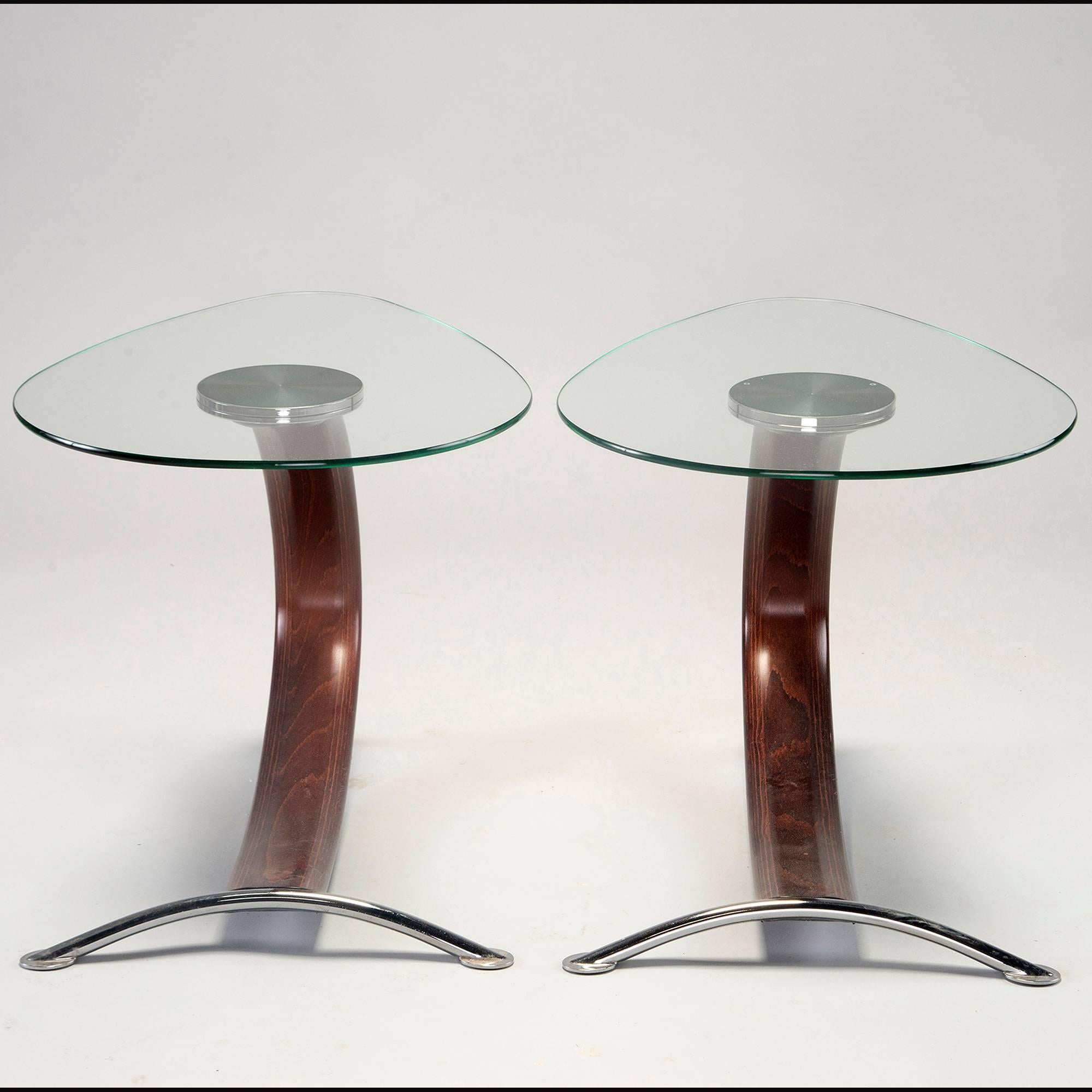 Pair of end tables found in Italy, circa 1970s. Tear drop shaped glass tops with chrome hardware and bentwood base. Wood is colored and figured like rosewood but the exact species and maker is unknown. Sold and priced as a pair.