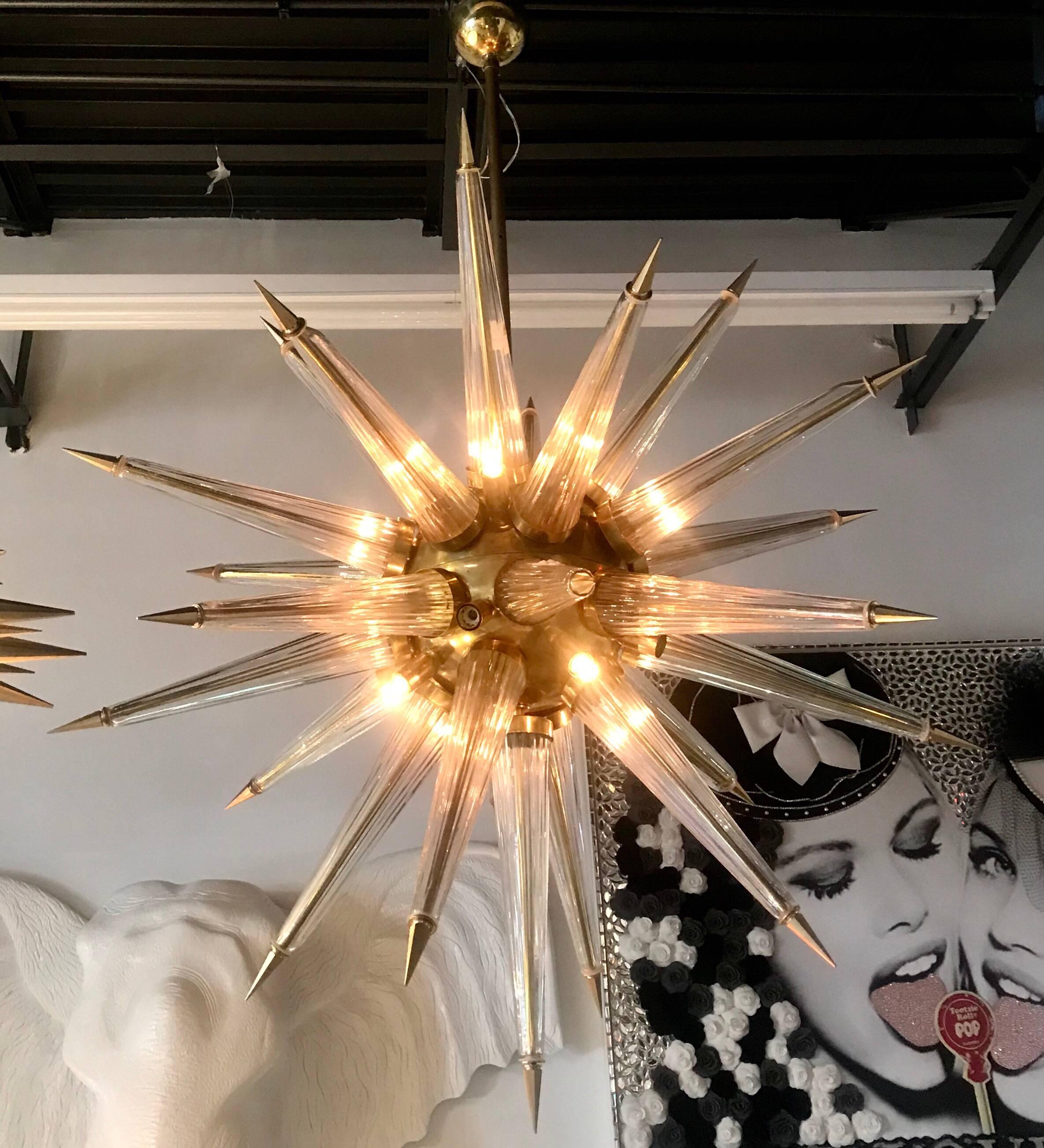 Exceptional midcentury Murano glass chandelier with bronze base and tips.
 
