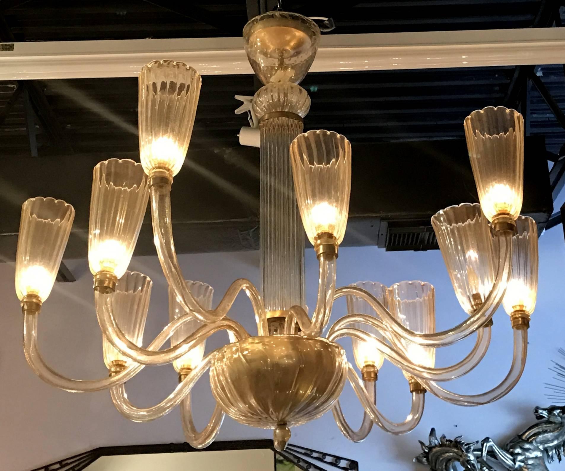 Spectacular in size and quality! This Murano glass with gold inclusion creates a beautiful warm light when illuminated and is incredibly elegant to behold whether lit or not.