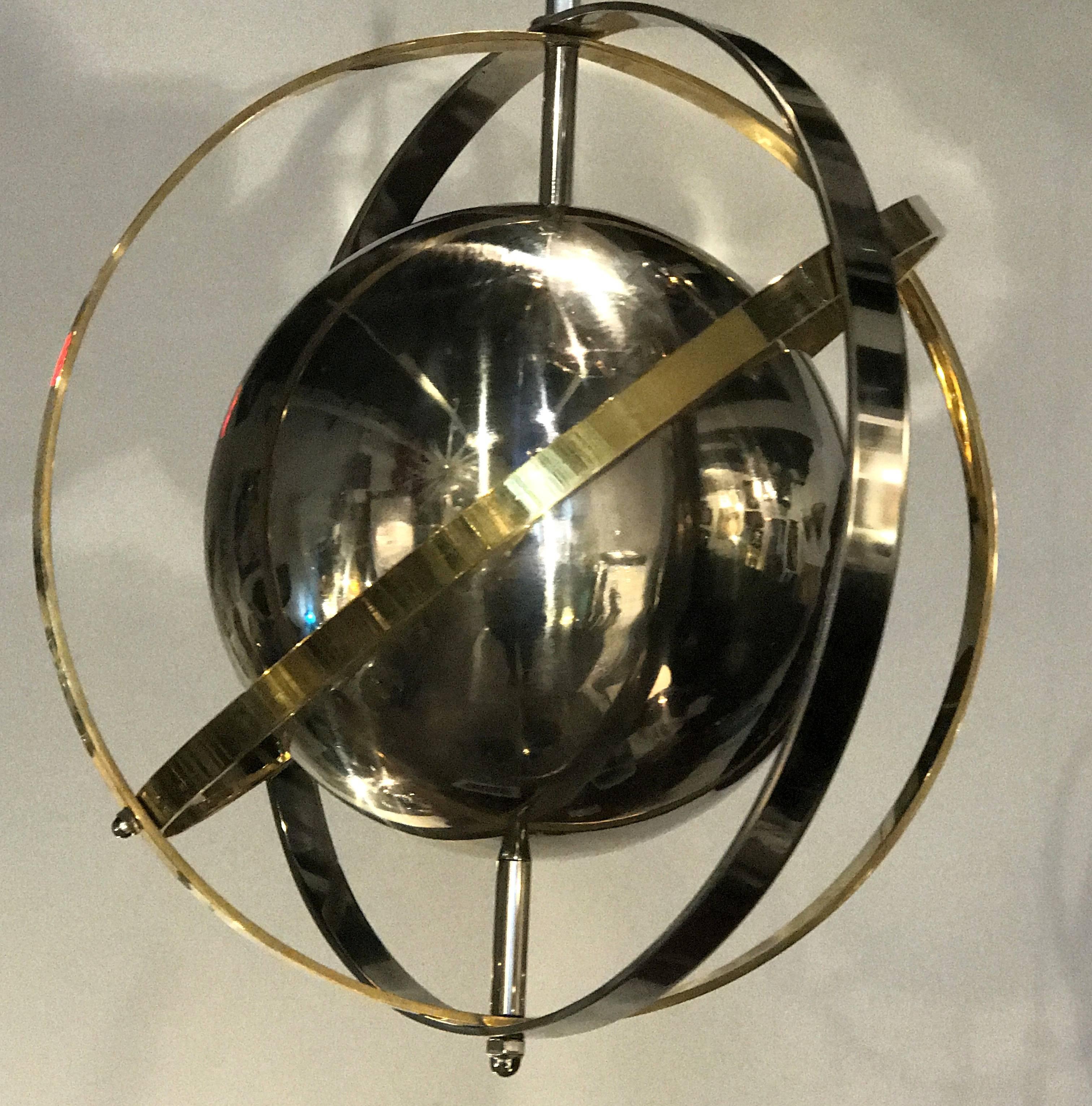 Pair of Brass, Stainless Steel and Lucite Armillary Sphere Chandeliers 1