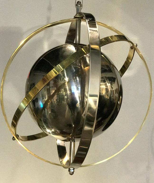 Pair of Brass, Stainless Steel and Lucite Armillary Sphere Chandeliers at 1stDibs