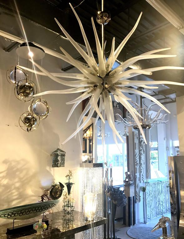 Pair of Brass, Stainless Steel and Lucite Armillary Sphere Chandeliers at 1stDibs
