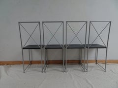 Mid Century Designer Set of Four Flexform Leather Dining Chairs