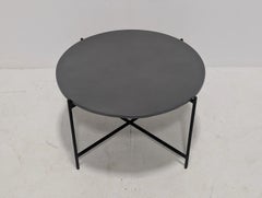 Contemporary Round Concrete Coffee Table with Black Metal Cross Frame