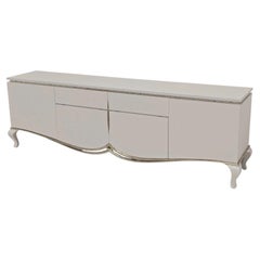 Credenza di design "Christopher Guy Harper" in laccato bianco con foglia d'argento