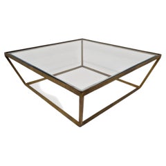 Tavolino da caffè contemporaneo di design in metallo dorato e vetro