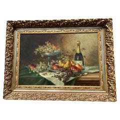 Tableau ancien français représentant une nature morte, à l'huile sur toile, vers 1900, dans un cadre doré ouvragé