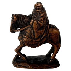 Japanese Meiji Boxwood Netsuke of a Wise Man on Horseback by Masayuki, 19th C