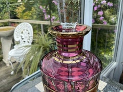 Antique Moser Ruby Cut-to-Clear Cabochon Gilt Glass Decanter, Bohemia circa 1920