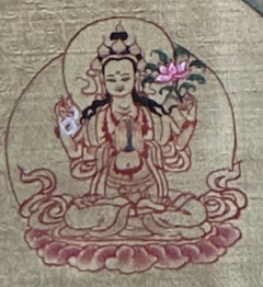 Thangka tibetana del tardo XX secolo raffigurante il mandala d'oro di Chenrezig, con broccato di seta