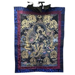 Late 20th Century Tibetan Black and Gold Green Tara Thangka with Silk Brocade