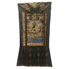 Late 20th C Tibetan Black and Gold Shakyamuni Buddha Thangka with Silk Brocade