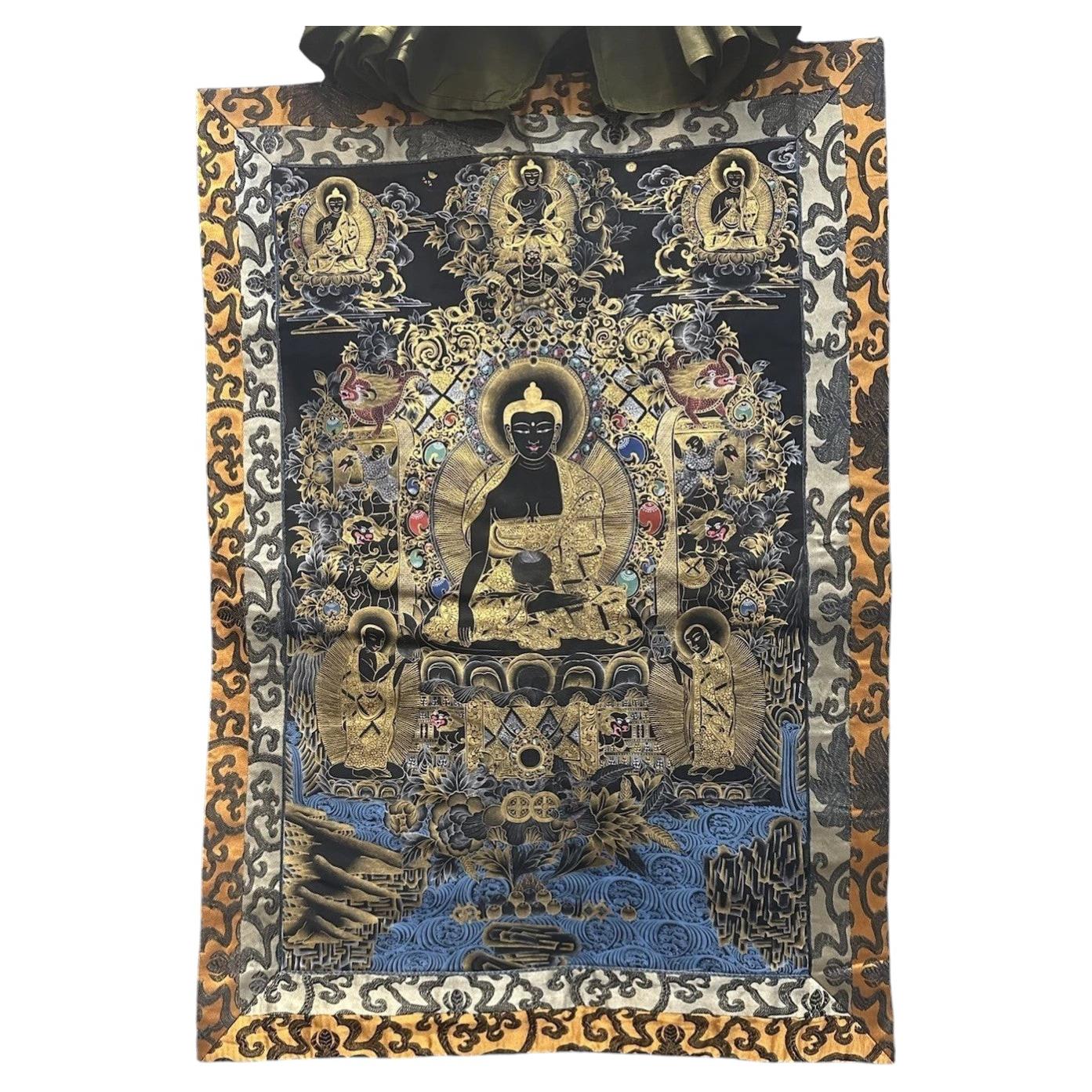 Late 20th C Tibetan Black and Gold Shakyamuni Buddha Thangka with Silk Brocade For Sale