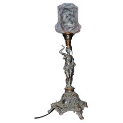 Lampada da tavolo figurativa in bronzo raffigurante un portatore d’acqua, di Louis Valentin Elias Robert, 1859 circa