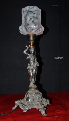 Lampada da tavolo figurativa in bronzo raffigurante un portatore d’acqua, di Louis Valentin Elias Robert, 1859 circa