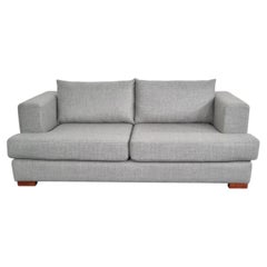 Canapé « Castelbajac » de Ligne Roset en laine gris clair de luxe
