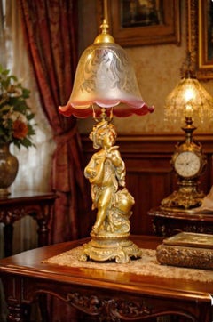 Edwardian Gilt Brass Cherub Musician Lamp with Cranberry Glass, c.1910