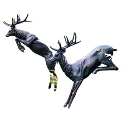 Pair of Life-Size Cast Aluminium Leaping Stag Garden Sculptures in Bronze Patina