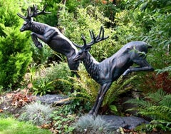 Pair of Life-Size Cast Aluminium Leaping Stag Garden Sculptures in Bronze Patina