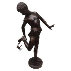 Italian Bronze Boy with Crab Figural Garden Sculpture