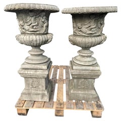 Pair of Large English Classical Stone Garden Urns with Cherub