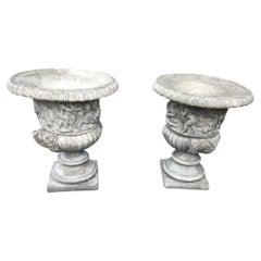 Pair of Large English Classical Stone Garden Urns with Cherub