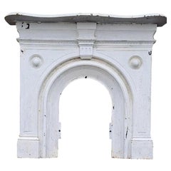 Large Victorian Cast Iron Arched Fireplace with Serpentine Mantel
