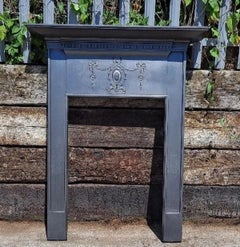 Antique Edwardian Cast Iron Mantel Surround with Classical Decoration