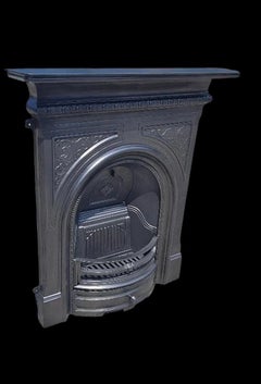 Victorian Style Cast Iron Fireplace with Arched Opening
