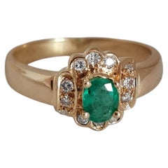 Bague vintage en or 18 carats, avec émeraude et diamants