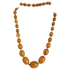 Antique Art Deco Graduated Amber-Colour Marbled Bead Necklace, circa 1930