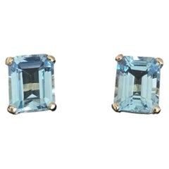 Boucles d'oreilles en or jaune 14 carats avec topaze taille émeraude