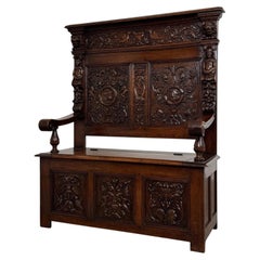 Exceptional 19th Century Antique English Carved Oak Settle with Storage