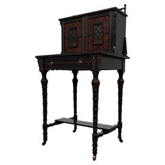 Magnifique meuble antique anglais de style victorien du XIXe siècle, en bois noirci et incrusté d’amboyna