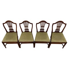 Precioso conjunto antiguo de cuatro sillas de comedor inglesas de estilo georgiano del siglo XVIII, de caoba