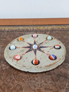 Antique Folk Art Nine Holes Marble Game Board with Glass Marbles, circa 1900