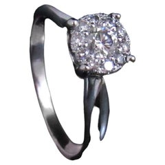 Bague de fiançailles en diamant raffiné et or blanc 18 carats