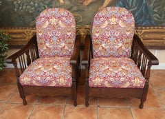 Antique Pair of English Country Oak Wheel-Back Reclining Chairs, circa 1920