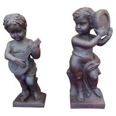 Antique Pair of Large Cast Iron Putti Sculptures Late 19th Century
