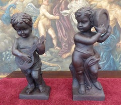 Antique Pair of Large Cast Iron Putti Sculptures Late 19th Century